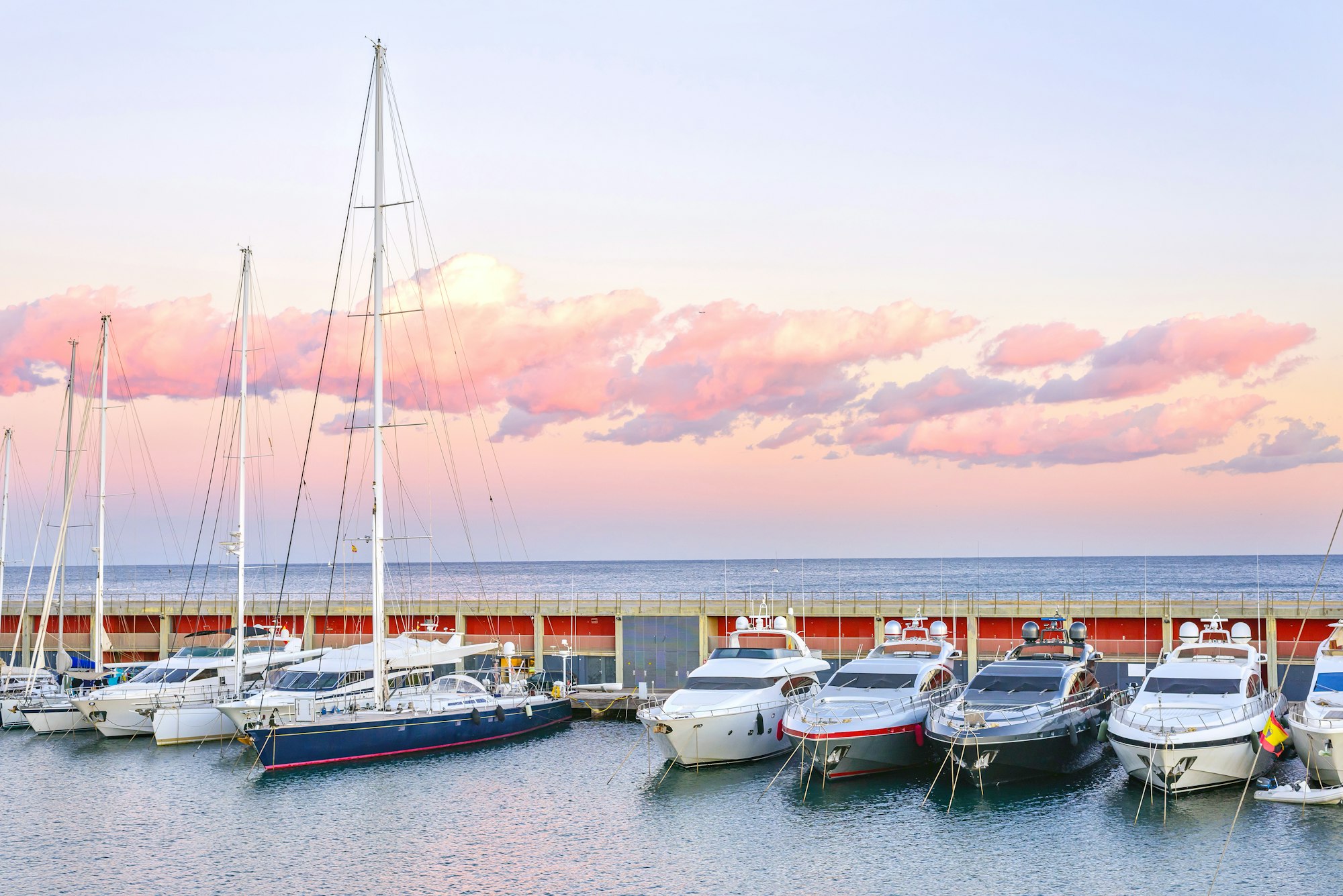 Boats at the Pier in Barcelona, Spain. Warm Sunset