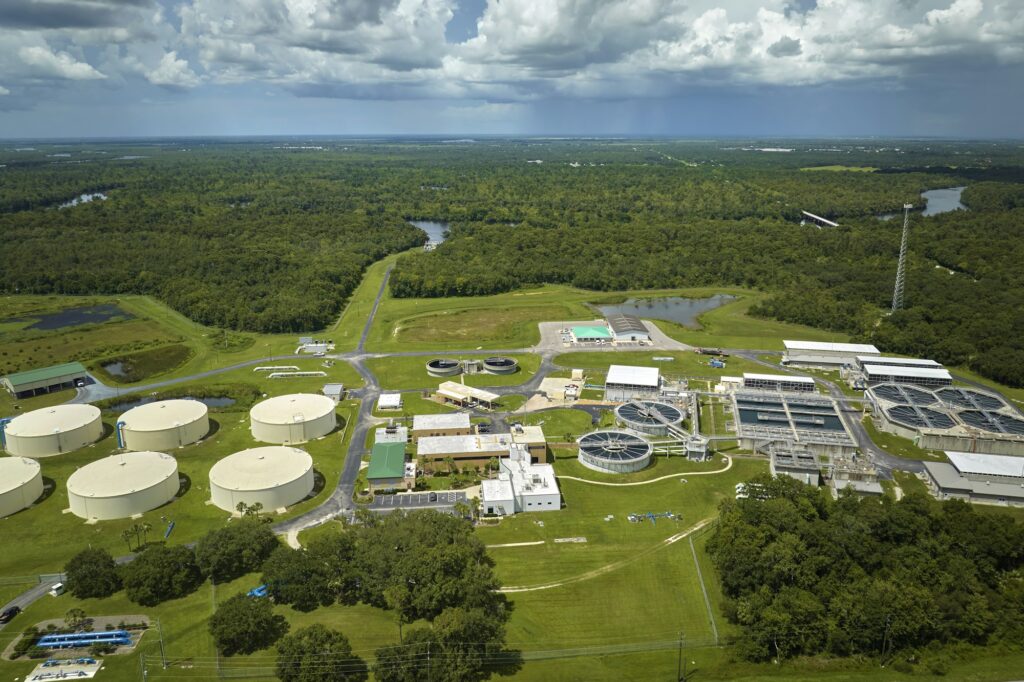 Aerial view of modern water cleaning facility at urban wastewater treatment plant.